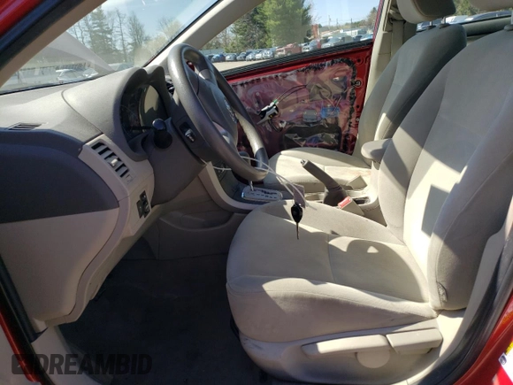 2010 Toyota Corolla with VIN 1NXBU4EE2AZ275061, listed as a Copart auction lot 52596765 with 113,833 mi miles and Salvage Title. Bid and sale history available at DreamBid. Image 7.