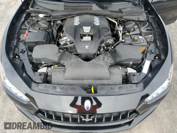 2019 Maserati Ghibli с VIN ZAM57XSA3K1311169, выставлен на аукционе Copart как лот 49583325 с пробегом 66 290 миль миль и Списание • Salvage title. История ставок и продаж доступна на DreamBid. Изображение 11.