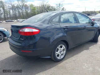 2014 Ford Fiesta SE with VIN 3FADP4BJ0EM150811, listed as a IAAI auction lot 42060983 with 180,952 mi miles. Bid and sale history available at carsss.com. Image 4.