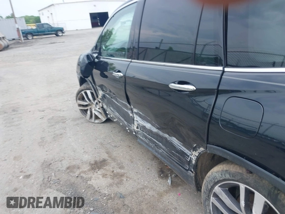 2017 Honda Pilot Touring with VIN 5FNYF6H90HB052474, listed as a IAAI auction lot 42291464 with 103,288 mi miles and . Bid and sale history available at DreamBid. Image 6.