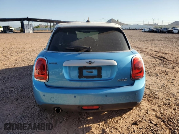 2015 MINI Hardtop 4 Door with VIN WMWXS5C54FT827341, listed as a Copart auction lot 63872395 with 83,023 mi miles and Salvage title. Bid and sale history available at DreamBid. Image 6.
