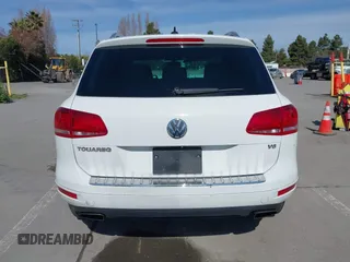 2012 Volkswagen Touareg Sport with VIN WVGEF9BP5CD007294, listed as a IAAI auction lot 41841268 with 160,883 mi miles and . Bid and sale history available at DreamBid. Image 16.