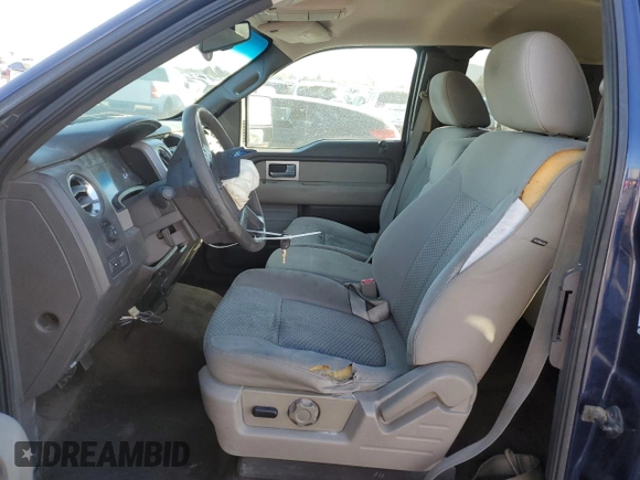 2009 Ford F-150 XLT with VIN 1FTRX12V19FA99116, listed as a Copart auction lot 84876434 with 169,975 mi miles and Salvage title. Bid and sale history available at DreamBid. Image 7.