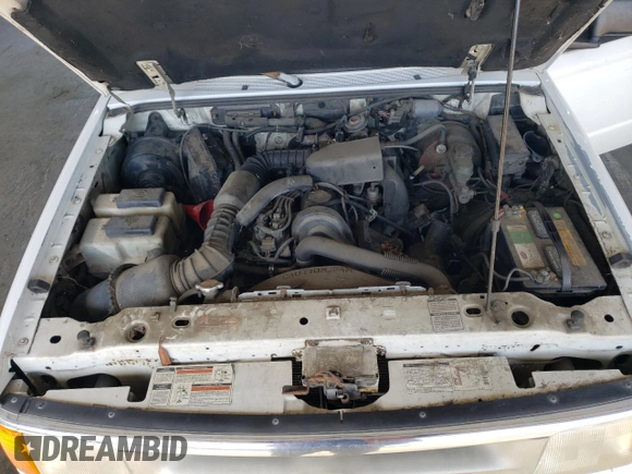 1996 Ford Ranger XL z VIN 1FTCR10A6TUC84491, wystawiony jako Copart lot #58954475 z przebiegiem 218 487 mil mil oraz Czysty tytuł • Clean title. Historia ofert i sprzedaży dostępna na DreamBid. Obrazek 11.