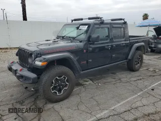2022 Jeep Gladiator Rubicon z VIN 1C6JJTBG7NL105497, wystawiony jako Copart lot #88300435 z przebiegiem 15 506 mil mil oraz Szkoda całkowita • Salvage title. Historia ofert i sprzedaży dostępna na DreamBid. Obrazek 1.