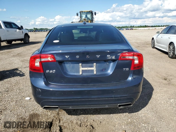 2014 Volvo S60 T5 z VIN YV1612FS5E1296303, wystawiony jako Copart lot #56480725 z przebiegiem 52 318 mil mil oraz Szkody całkowita. Historia ofert i sprzedaży dostępna na DreamBid. Obrazek 6.