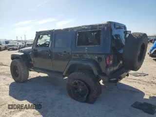 2015 Jeep Wrangler Unlimited Rubicon Hard Rock with VIN 1C4HJWFG1FL710264, listed as a Copart auction lot 47563975 with 96,737 mi miles and Salvage title. Bid and sale history available at DreamBid. Image 2.