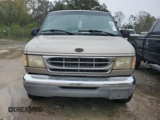 2001 Ford Econoline Passenger XL with VIN 1FBSS31LX1HA23564, listed as a Copart auction lot 77703044 with 276,538 mi miles and Salvage title. Bid and sale history available at DreamBid. Image 5.