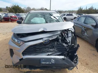 2021 Toyota RAV4 Hybrid LE z VIN JTMLWRFV8MD129136, wystawiony jako IAAI lot #41644636 z przebiegiem 82 253 mil mil oraz . Historia ofert i sprzedaży dostępna na DreamBid. Obrazek 12.
