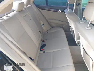 2014 Mercedes-Benz C-Class C 250 Sport with VIN WDDGF4HB3EG250671, listed as a IAAI auction lot 41607910 with 136,556 mi miles. Bid and sale history available at carsss.com. Image 8.