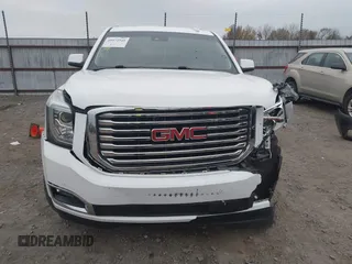 2018 GMC Yukon SLT with VIN 1GKS1BKC3JR279163, listed as a IAAI auction lot 40973940 with 122,445 mi miles. Bid and sale history available at carsss.com. Image 12.