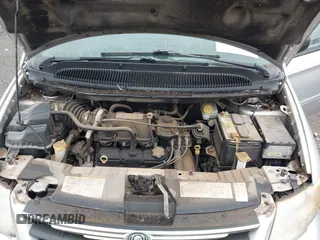 2005 Chrysler Town & Country LX with VIN 2C4GP44R35R152152, listed as a IAAI auction lot 42190551 with 128,239 mi miles and . Bid and sale history available at DreamBid. Image 10.