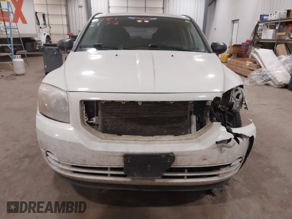2010 Dodge Caliber SXT with VIN 1B3CB4HA3AD590654, listed as a IAAI auction lot 41814572 with 203,422 mi miles and . Bid and sale history available at DreamBid. Image 13.