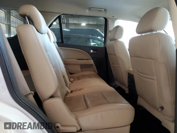 2008 Ford Taurus X Limited z VIN 1FMDK03W18GA17707, wystawiony jako Copart lot #85287524 z przebiegiem 121 231 mil mil oraz Nie do naprawy • Non repairable. Historia ofert i sprzedaży dostępna na DreamBid. Obrazek 11.