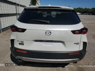 2024 Mazda CX-50 Premium z VIN 7MMVABDY9RN194560, wystawiony jako Copart lot #73734794 z przebiegiem 3 585 mil mil oraz Szkoda całkowita • Salvage title. Historia ofert i sprzedaży dostępna na DreamBid. Obrazek 6.