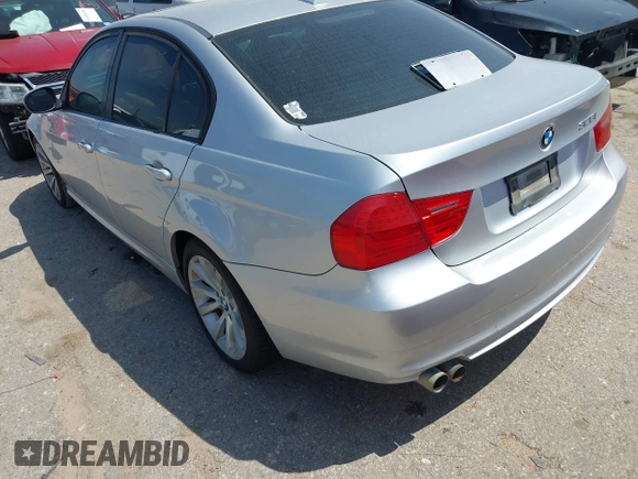 2011 BMW 3 Series 328i with VIN WBAPH7G57BNM58073, listed as a IAAI auction lot 41883231 with 144,539 mi miles. Bid and sale history available at carsss.com. Image 3.