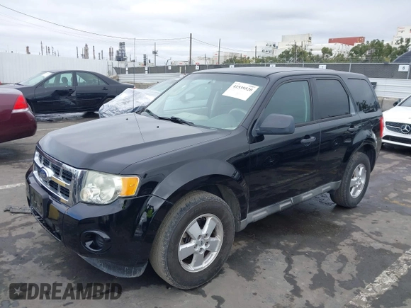 2012 Ford Escape XLS with VIN 1FMCU0C74CKB13755, listed as a IAAI auction lot 41539520 with 140,764 mi miles and . Bid and sale history available at DreamBid. Image 2.