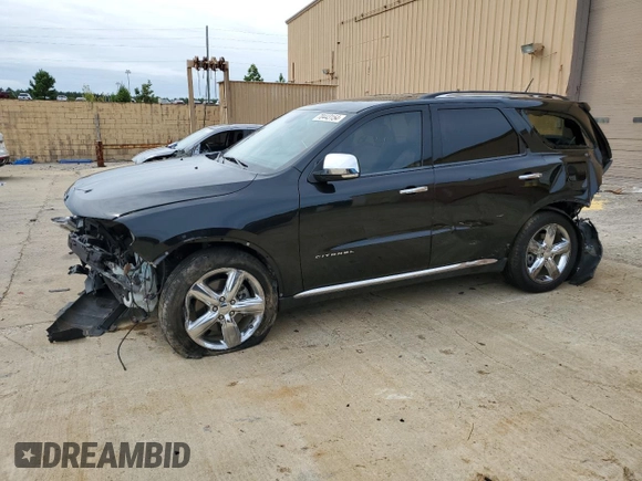 2012 Dodge Durango Citadel with VIN 1C4RDHEG7CC247504, listed as a Copart auction lot 70443154 with 115,888 mi miles and Salvage title. Bid and sale history available at DreamBid. Image 1.