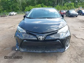 2019 Toyota Corolla L with VIN 5YFBURHE1KP923291, listed as a IAAI auction lot 42173538 with 60,184 mi miles and . Bid and sale history available at DreamBid. Image 6.