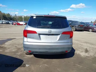 2016 Honda Pilot EX-L with VIN 5FNYF6H72GB097557, listed as a IAAI auction lot 41628145 with 155,151 mi miles. Bid and sale history available at carsss.com. Image 16.