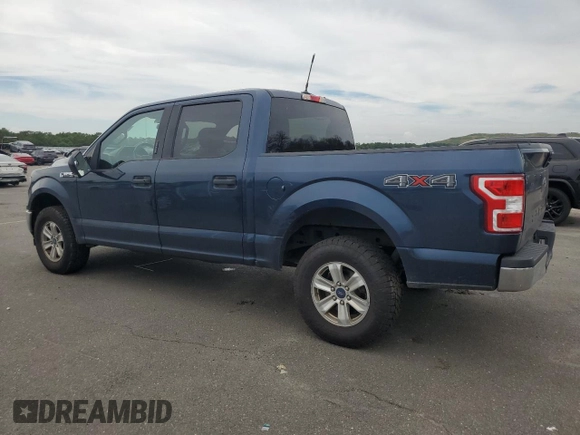 2019 Ford F-150 XL with VIN 1FTEW1E55KFC10642, listed as a Copart auction lot 62811755 with 128,286 mi miles and Salvage title. Bid and sale history available at DreamBid. Image 2.
