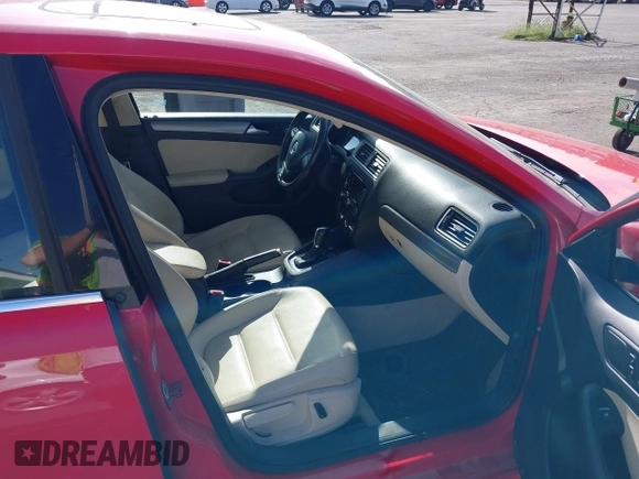 2014 Volkswagen Jetta TDI w/Premium with VIN 3VWLL7AJ8EM372627, listed as a IAAI auction lot 42418054 with 119,926 mi miles and . Bid and sale history available at DreamBid. Image 5.