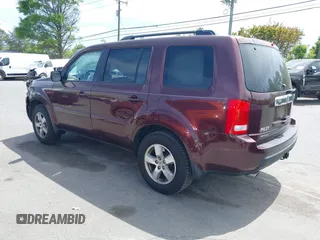 2011 Honda Pilot EX-L with VIN 5FNYF4H59BB090116, listed as a IAAI auction lot 42048811 with 158,857 mi miles and . Bid and sale history available at carsss.com. Image 3.