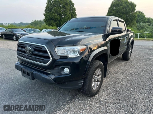 2019 Toyota Tacoma SR z VIN 3TMCZ5AN0KM203691, wystawiony jako Copart lot #60376205 z przebiegiem 218 516 mil mil oraz Czysty tytuł • Clean title. Historia ofert i sprzedaży dostępna na DreamBid. Obrazek 2.