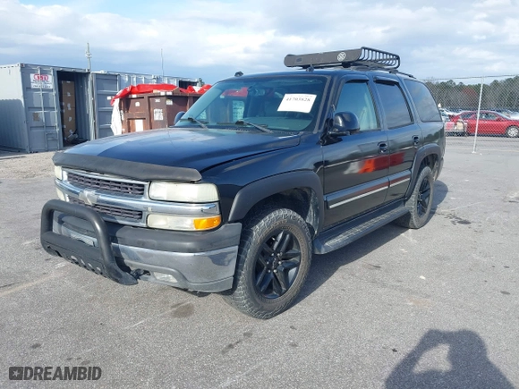 2004 Chevrolet Tahoe LT with VIN 1GNEC13ZX4J106072, listed as a IAAI auction lot 41703828 with 275,081 mi miles. Bid and sale history available at carsss.com. Image 2.