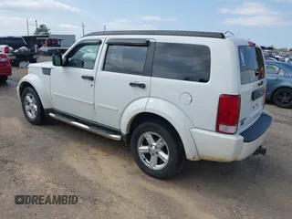 2008 Dodge Nitro SXT with VIN 1D8GU28K18W129119, listed as a IAAI auction lot 41899314 with 244,830 mi miles. Bid and sale history available at carsss.com. Image 3.
