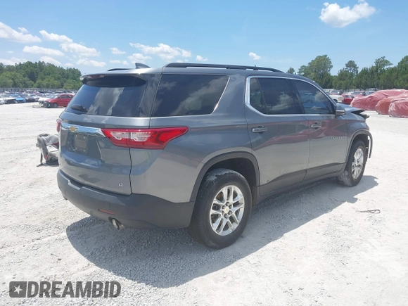 2019 Chevrolet Traverse LT Cloth with VIN 1GNERGKW0KJ123288, listed as a IAAI auction lot 42345412 with 78,696 mi miles and . Bid and sale history available at DreamBid. Image 4.