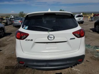 2016 Mazda CX-5 Grand Touring with VIN JM3KE2DY0G0888854, listed as a Copart auction lot 68379754 with 73,096 mi miles and Salvage Title. Bid and sale history available at carsss.com. Image 6.