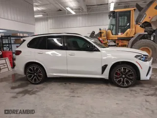 2023 BMW X5 M with VIN 5YMJU0C04P9N91130, listed as a IAAI auction lot 41218261 with 1 mi miles. Bid and sale history available at carsss.com. Image 13.