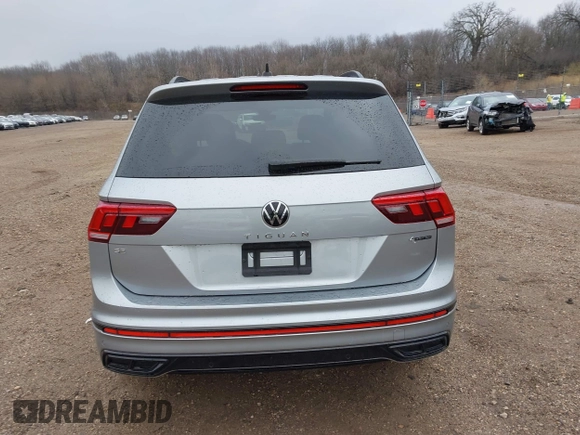 2023 Volkswagen Tiguan SE R-Line Black with VIN 3VV8B7AX3PM130610, listed as a IAAI auction lot 42011131 with 21,980 mi miles and . Bid and sale history available at DreamBid. Image 16.