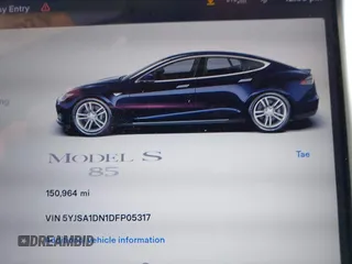 2013 Tesla Model S with VIN 5YJSA1DN1DFP05317, listed as a IAAI auction lot 42086998 with 150,964 mi miles. Bid and sale history available at carsss.com. Image 7.