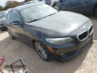 2014 BMW 2 Series 228i with VIN WBA1F5C57EVV99185, listed as a IAAI auction lot 41712282 with 156,783 mi miles and . Bid and sale history available at carsss.com. Image 1.