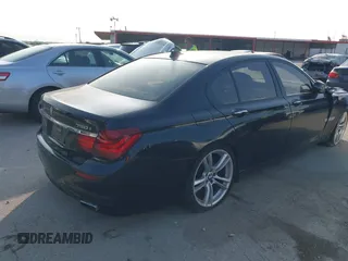 2013 BMW 7 Series 750i with VIN WBAYA8C59DC996552, listed as a IAAI auction lot 41921201 with 99,188 mi miles and . Bid and sale history available at DreamBid. Image 4.