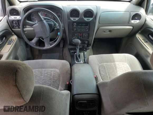 2004 GMC Envoy SLE with VIN 1GKDS13S942119615, listed as a Copart auction lot 69653494 with 141,856 mi miles and Salvage Title. Bid and sale history available at carsss.com. Image 8.