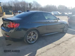 2015 BMW 2 Series M235i xDrive with VIN WBA1J9C58FVX98415, listed as a Copart auction lot 49793655 with 110,169 mi miles and Salvage Title. Bid and sale history available at DreamBid. Image 3.