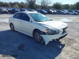 2010 Mitsubishi Lancer ES with VIN JA32U2FU0AU033365, listed as a IAAI auction lot 41671843 with 157,905 mi miles. Bid and sale history available at carsss.com. Image 1.