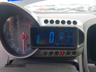 2013 Chevrolet Sonic LS with VIN 1G1JA5SH4D4138164, listed as a IAAI auction lot 42677319 with 144,244 mi miles and . Bid and sale history available at DreamBid. Image 7.