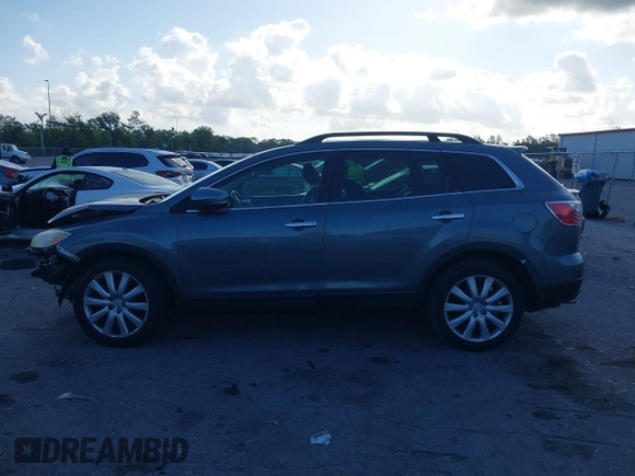 2010 Mazda CX-9 Grand Touring with VIN JM3TB3MV3A0220398, listed as a IAAI auction lot 41796315 with 207,635 mi miles. Bid and sale history available at carsss.com. Image 15.