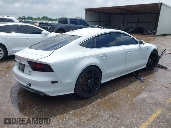 2014 Audi A7 Prestige z VIN WAU2GAFC7EN126780, wystawiony jako IAAI lot #42095865 z przebiegiem Nie podano mil oraz . Historia ofert i sprzedaży dostępna na DreamBid. Obrazek 4.