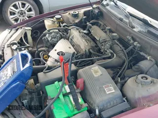 1996 Toyota Camry DX z VIN 4T1BG12K5TU756036, wystawiony jako IAAI lot #43304027 z przebiegiem 128 756 mil mil oraz . Historia ofert i sprzedaży dostępna na DreamBid. Obrazek 13.