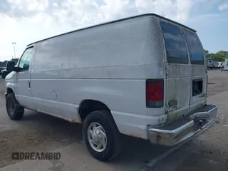 2011 Ford Econoline Cargo Commercial with VIN 1FTNE2EW7BDA51829, listed as a IAAI auction lot 42698973 with 197,907 mi miles and . Bid and sale history available at DreamBid. Image 3.