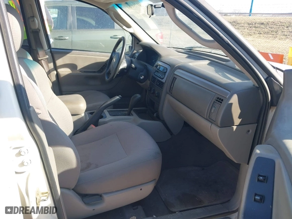 2004 Jeep Grand Cherokee Laredo with VIN 1J4GX48S84C206933, listed as a IAAI auction lot 41739364 with 257,893 mi miles. Bid and sale history available at carsss.com. Image 5.