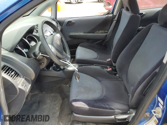 2007 Honda Fit with VIN JHMGD38437S043630, listed as a Copart auction lot 68904544 with 127,279 mi miles and Salvage Title. Bid and sale history available at carsss.com. Image 7.