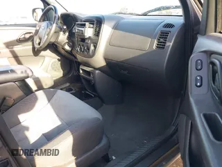 2004 Ford Escape with VIN 1FMCU02174KA61956, listed as a IAAI auction lot 41913605 with 166,587 mi miles and . Bid and sale history available at DreamBid. Image 5.
