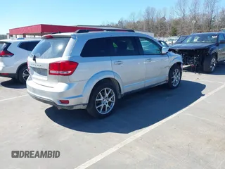 2014 Dodge Journey SXT z VIN 3C4PDCBG7ET227470, wystawiony jako IAAI lot #41843128 z przebiegiem 98 195 mil mil oraz . Historia ofert i sprzedaży dostępna na DreamBid. Obrazek 4.