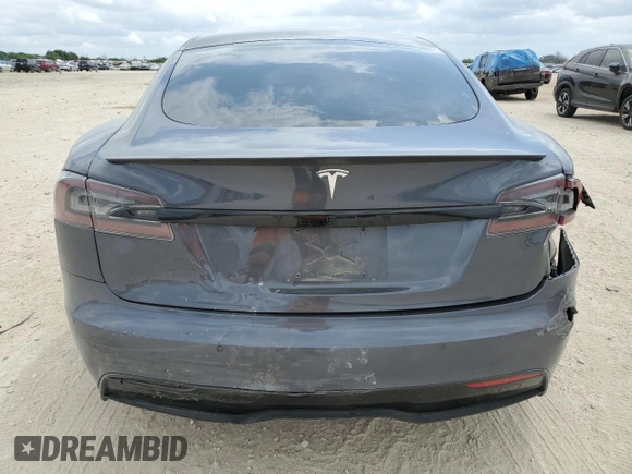 2021 Tesla Model S Long Range with VIN 5YJSA1E51MF453924, listed as a Copart auction lot 53486495 with 48,599 mi miles and Salvage title. Bid and sale history available at DreamBid. Image 6.